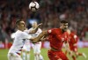 United States defender Aaron Long (23) and Canada forward Lucas Cavallini (19) battle for the ball during second half of CONCACAF Nations League soccer action in Toronto, Tuesday, Oct. 15, 2019. THE CANADIAN PRESS/Cole Burston