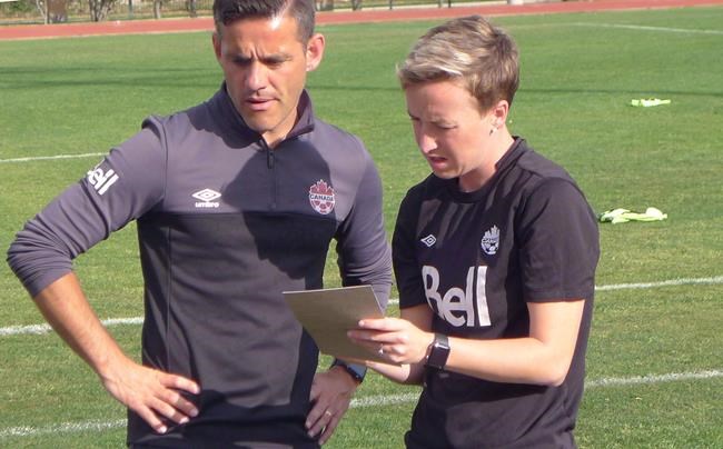 Coach John Herdman prepares for practice with Bev Priestman, a member of his coaching staff, ahead of Sunday's soccer game against the United States in the final of the CONCACAF Women's Olympic Qualifying Championship, in Houston on Saturday, Feb. 20, 2016. THE CANADIAN PRESS/Neil Davidson