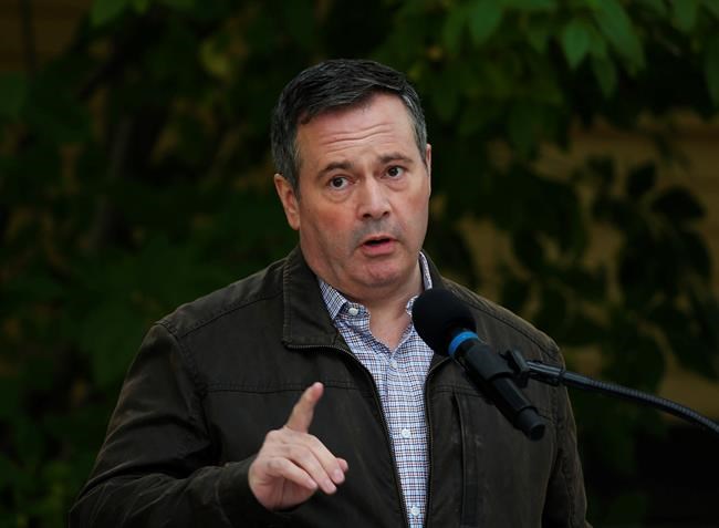 Alberta Premier Jason Kenney answers questions after announcing $43 million in repairs and improvements to provincial parks at a news conference in Calgary on Tuesday, Sept. 15, 2020. Members of Kenney’s caucus have refused an Opposition NDP bid to make public details of Alberta’s $7.5-billion investment in the failed Keystone XL pipeline project.THE CANADIAN PRESS/Todd Korol