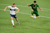 Portland Timbers forward Felipe Mora, right, goes up for the ball as Vancouver Whitecaps midfielder Andy Rose defends during the first half of an MLS soccer match in Portland, Ore., on September 27, 2020. The Vancouver Whitecaps have signed defender/midfielder Andy Rose to a one-year extension. THE CANADIAN PRESS/AP, Steve Dykes