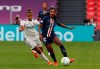 Lyon's Nikita Parris, left, chases PSG's Ashley Lawrence during the Women's Champions League semifinal soccer match between Lyon and Paris Saint-Germain in Bilbao, Spain, Wednesday, Aug. 26, 2020. THE CANADIAN PRESS/AP, Villar Lopez - POOL