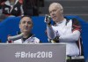 Team Ontario skip Glenn Howard skip speaks with coach Wayne Middaugh during round robin competition against Team Saskatchewan at the Brier curling championship in Ottawa on March 10, 2016. THE CANADIAN PRESS/Adrian Wyld