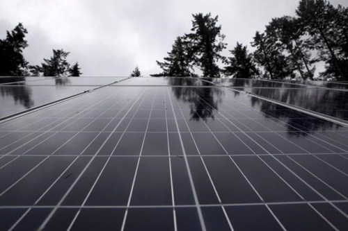 Solar panels are shown in Lasqueti Island, B.C., Thursday, November 24, 2016.&nbsp;The federal government is announcing $55 million in funding to support Canada's clean tech sector.The money will go to 20 companies across the country.THE CANADIAN PRESS/Chad Hipolito