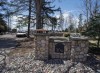 A fire-destroyed property registered to Gabriel Wortman at 200 Portapique Beach Road is seen in Portapique, N.S., Friday, May 8, 2020. The spouse of the gunman who killed 22 people in Nova Scotia told a police officer she was beaten in her bed, shot at, and begged for her life before she managed to escape into the woods before his rampage began. THE CANADIAN PRESS/Andrew Vaughan