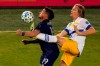 San Jose Earthquakes midfielder Florian Jungwirth, right, and Sporting Kansas City forward Erik Hurtado (19) battle for the ball during overtime of an MLS soccer match Sunday, Nov. 22, 2020, in Kansas City, Kan. THE CANADIAN PRESS/AP/Charlie Riedel