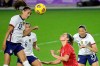 U.S. forward Alex Morgan (13) attempts a header on goal in front of Canada defender Shelina Zadorsky (4) during the second half of a SheBelieves Cup women's soccer match in Orlando, Fla., Thursday, Feb. 18, 2021. THE CANADIAN PRESS/AP-Phelan M. Ebenhack