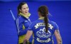 Team Alberta skip Laura Walker, left, laughs with third Kate Cameron at the Scotties Tournament of Hearts in Calgary, Alta., Saturday, Feb. 20, 2021.THE CANADIAN PRESS/Jeff McIntosh