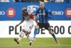 Montreal Impact's Laurent Ciman, right, challenges D.C. United's Lloyd Sam during second half MLS soccer action in Montreal, Saturday, July 1, 2017. THE CANADIAN PRESS/Graham Hughes