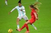 Canada defender Shelina Zadorsky, right, passes the ball in front of Argentina forward Sole Jaimes (9) during the second half of a SheBelieves Cup women's soccer match, Sunday, Feb. 21, 2021, in Orlando, Fla. Alphonso Davies and Shelina Zadorsky have been named Canada Soccer’s players of the month for February. THE CANADIAN PRESS/AP, Phelan M. Ebenhack