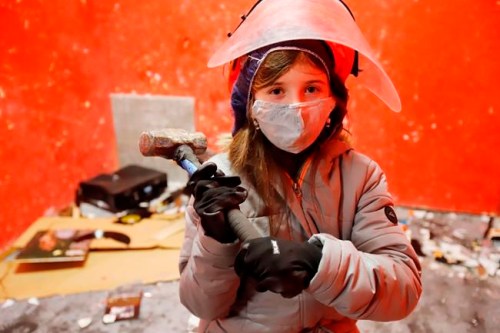 Grace Roswell, 12, poses for a photo as she celebrates her birthday by breaking things in the Vengeance Van, a rage room on wheels, in Ottawa on Tuesday, February 9, 2021. THE CANADIAN PRESS/Patrick Doyle