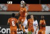 Hamilton Forge FC's Giuliano Frano (8) heads the ball against CD Olimpia's Jorge Benguche (9) during Scotiabank CONCACAF League 2019 second half soccer action in Hamilton, Ont., Thursday, Aug. 22, 2019. Forge FC owner Bob Young says the Canadian Premier League champions will be playing the Canadian Championship final against Toronto FC at a disadvantage. THE CANADIAN PRESS/Peter Power