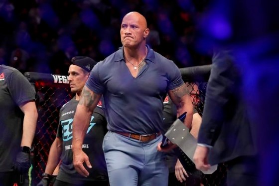 Dwayne (The Rock) Johnson reacts after a welterweight mixed martial arts bout between Nate Diaz and Jorge Masvidal at UFC 244 early Sunday, Nov. 3, 2019, in New York. THE CANADIAN PRESS/AP/Frank Franklin II