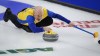 Team Wild Card Two skip Kevin Koe makes a shot as he plays Team Nunavut at the Brier in Calgary, Alta., Monday, March 8, 2021.THE CANADIAN PRESS/Jeff McIntosh