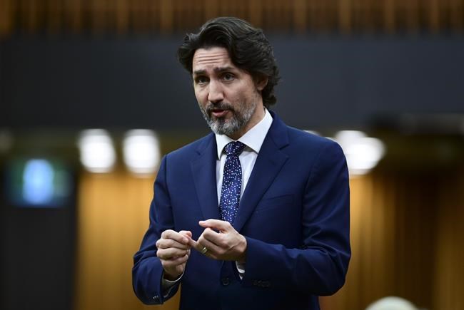 Prime Minister Justin Trudeau rises during question period in the House of Commons on Parliament Hill, in Ottawa, Thursday, March 11, 2021. Prime Minister Justin Trudeau says Pfizer has guaranteed delivery of at least 1 million COVID-19 vaccine doses per week starting later this month. THE CANADIAN PRESS/Sean Kilpatrick