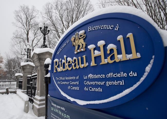 A sign along the wall surrounding Rideau Hall is seen in Ottawa, Thursday, Jan. 21, 2021. The Liberal government is re-establishing an advisory panel to help select the next governor general. THE CANADIAN PRESS/Adrian Wyld
