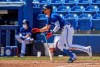 Toronto Blue Jays' Cavan Biggio watches his fly ball to center field during the fourth inning of a spring training baseball game against the New York Yankees Sunday, March 14, 2021, at TD Ballpark in Dunedin, Fla. THE CANADIAN PRESS/Steve Nesius