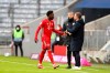 Bayern's Alphonso Davies leaves the pitch after receiving a red card during the German Bundesliga soccer match between FC Bayern Munich and VfB Stuttgart in Munich, Germany, Saturday, March 20, 2021. The 20-year-old fullback from Edmonton was initially yellow-carded in the 11th minute after catching Wataru Endo's foot with a challenge. THE CANADIAN PRESS/AP-Matthias Schrader, POOL