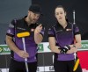Darren Moulding and Joanne Courtney discuss their options at the back of the house during draw 1 against team Peterman/Gallant at the Canadian Mixed Curling Championship in Calgary on Thursday, March 18, 2021. THE CANADIAN PRESS/HO - Curling Canada, Michael Burns Photo