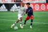 New England Revolution forward Tajon Buchanan (17) defends against Montreal Impact forward Romell Quioto during the first half of an MLS soccer match in&nbsp;Foxborough, Mass., on November 20, 2020. THE CANADIAN PRESS/AP, Stew Milne