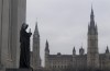 The statue representing justice looks out from the Supreme Court of Canada over the Parliamentary precinct in Ottawa, Thursday March 25, 2021. THE CANADIAN PRESS/Adrian Wyld