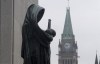 The statue representing justice looks out from the Supreme Court of Canada over the Parliamentary precinct in Ottawa, Thursday March 25, 2021. THE CANADIAN PRESS/Adrian Wyld