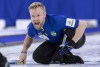 Sweden skip Niklas Edin watches calls for the sweep on his shot during the gold medal game against Canada at the Men's World Curling Championship in Lethbridge, Alta. on Sunday, April 7, 2019. THE CANADIAN PRESS/Paul Chiasson