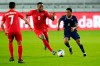 Canada forward Cyle Larin (9) and Bermuda defender Kane Critchlow (8) battle for the ball during the first half of a World Cup 2022 Group B qualifying soccer match, Thursday, March 25, 2021, in Orlando, Fla. THE CANADIAN PRESS/AP-John Raoux&nbsp;