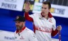 Team Canada skip Brendan Bottcher, right, gestures to his teammates as they play the United States at the Men's World Curling Championships in Calgary, Alta., Monday, April 5, 2021.THE CANADIAN PRESS/Jeff McIntosh