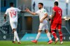 Canada's Lucas Cavallini (11) celebrates a goal with Mark-Anthony Kaye as Cayman Islands defender Tyler Lee reacts during the second half of a World Cup 2022 Group B qualifying soccer match Monday, March 29, 2021, in Bradenton, Fla. Canada, on the strength of wins over Bermuda and the Cayman Islands, has moved up three places to No. 70 in the FIFA world rankings. THE CANADIAN PRESS/AP/Mike Carlson