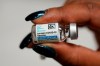 Sharis Carr, a nurse at the Aaron E. Henry Community Health Service Center in Clarksdale, Miss., holds a vial of the Johnson & Johnson COVID-19 vaccine that was administered to seniors, Wednesday, April 7, 2021. A second COVID-19 vaccine is being investigated for possible links to blood clots, though the syndrome appears to be extremely rare. THE CANADIAN PRESS/AP/Rogelio V. Solis