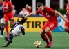 Toronto FC's Patrick Mullins (13) controls the ball against New England Revolution midfielder Luis Caicedo, left, in the first half of an MLS soccer match at Gillette Stadium, Saturday, Aug. 31, 2019, in Foxborough, Mass. THE CANADIAN PRESS/AP-Elise Amendola