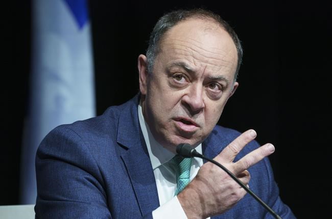 Quebec Health Minister Christian Dube responds to a question during a news conference in Montreal, on Thursday, April 8, 2021. THE CANADIAN PRESS/Paul Chiasson