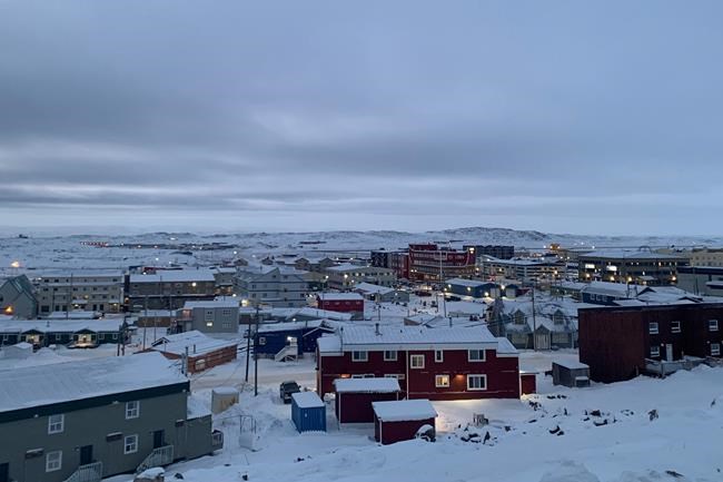 Downtown Iqaluit, Nunavut, is shown after 2 p.m. sunset on Tuesday, Nov. 24, 2020. Nunavut has declared an outbreak of COVID-19 in Iqaluit after 12 new cases were reported overnight. THE CANADIAN PRESS/Emma Tranter