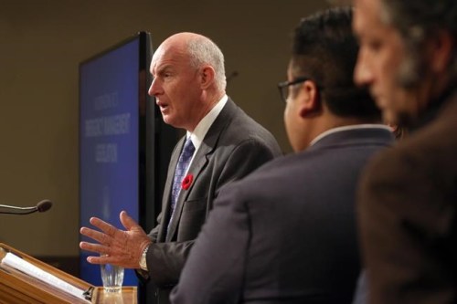 Minister of Public Safety and Solicitor General Mike Farnworth speaks during a press conference at the legislature in Victoria, Monday, Oct. 28, 2019. The British Columbia government is providing a few more details about travel restrictions aimed at limiting movement around the province to slow the spread of COVID-19. THE CANADIAN PRESS/Chad Hipolito