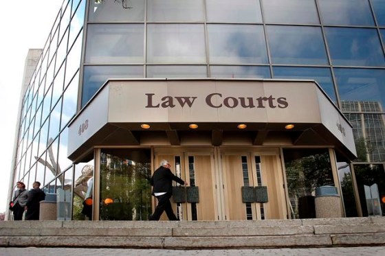 The Manitoba Law Courts building is shown in downtown Winnipeg, Monday, Aug. 18, 2014.  THE CANADIAN PRESS/John Woods