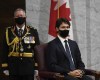 Chief of Defence Staff Jonathan Vance, left, and Prime Minister Justin Trudeau listen to Gov. Gen. Julie Payette deliver the throne speech in the Senate chamber in Ottawa on Wednesday, Sept. 23, 2020. Trudeau's former adviser has agreed to appear before a parliamentary committee to answer questions about the Liberal government's handling of an allegation of sexual misconduct involving former defence chief Gen. Jonathan Vance. THE CANADIAN PRESS/Adrian Wyld