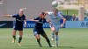 Portland Thorns' Christine Sinclair (12) battles with North Carolina Courage forward Crystal Dunn (19) during the second half of an NWSL Challenge Cup soccer match at Zions Bank Stadium Friday, July 17, 2020, in Herriman, Utah. THE CANADIAN PRESS/AP-Rick Bowmer