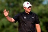 Taylor Pendrith from Richmond Hill, Ont. salutes the crowd after sinking a birdie on the 18th hole to come in at five under par during first round of play at the Canadian Open golf championship Thursday, July 24, 2014 in Montreal. THE CANADIAN PRESS/Paul Chiasson