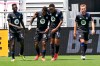 CF Montreal forward Romell Quioto (30) is congratulated by forward Mason Toye (13) after scoring a goal during the first half of an MLS soccer match against Toronto FC, Saturday, April 17, 2021, in Fort Lauderdale, Fla. THE CANADIAN PRESS/AP-Lynne Sladky