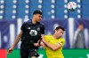 CF Montréal forward Bjorn Johnsen (9) and Nashville SC defender Dave Romney (4) head the ball during the second half of an MLS soccer match Saturday, April 24, 2021, in Nashville, Tenn. (AP Photo/Mark Humphrey)