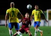 Venezuela's Yeferson Soteldo, centre, eyes the ball during a qualifying soccer match against Brazil for the FIFA World Cup Qatar 2022 in Sao Paulo, Brazil, Friday, Nov.13, 2020. THE CANADIAN PRESS/Fernando Bizerra/Pool via AP