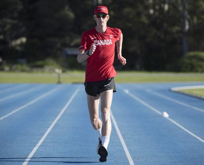 Canadian race walker Evan Dunfee, of Richmond, B.C., takes part in the team's training session for the Commonwealth Games in Gold Coast, Australia, Tuesday, April 3, 2018. THE CANADIAN PRESS/Ryan Remiorz