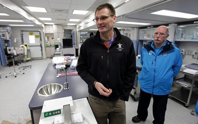 Director of medical services for VANOC, Dr. Mike Wilkinson, left, and mobile unit manager Dr. Ross Brown speak to reporters in a mobile medical unit set up for the Vancouver 2010 Winter Olympic Games in Whistler, B.C., on Wednesday, January 20, 2010. Wilkinson is confident that with the pace of the country's vaccine rollout, every Canadian athlete will be vaccinated before this summer's Tokyo Olympics. THE CANADIAN PRESS/Darryl Dyck