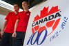 Canadian women's national soccer team players Christine Sinclair, left, of Burnaby, B.C., and Brittany Timko, of Coquitlam, B.C., pose next to the Canadian Soccer Association's 100th anniversary logo in Vancouver, B.C., Monday, Jan. 16, 2012. Canada Soccer Hall of Famer Brittany Timko Baxter has joined Canada Soccer's board of directors. THE CANADIAN PRESS/Darryl Dyck