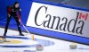 Canada skip Kerri Einarson lines up a shot against Switzerland at the Women's World Curling Championship in Calgary, Alta., Saturday, May 1, 2021. Tournament officials say multiple broadcasters have tested positive for COVID-19 at the LGT World Women's Curling Championship in Calgary. THE CANADIAN PRESS/Jeff McIntosh