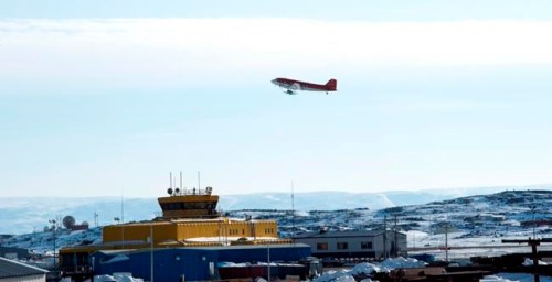 A plane takes off from the Iqaluit, Nunavut, airport on Saturday, April 25, 2015. Nunavut is suspending its common travel area with the Northwest Territories after a COVID-19 outbreak closed schools in Yellowknife. THE CANADIAN PRESS/Paul Chiasson