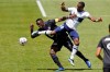 CF Montreal midfielder Victor Wanyama (2) and Vancouver Whitecaps forward Cristian Dajome, right, vie for the ball in first half MLS soccer action in Sandy, Utah, Saturday, May 8, 2021. Dajome had a brace, scoring off a penalty kick in the 57th minute and putting in a header in the 71st. THE CANADIAN PRESS?AP-Rick Bowmer
