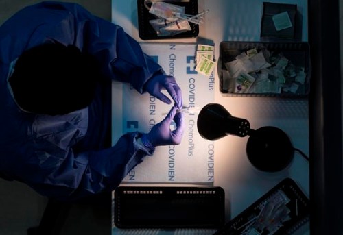 A dose of the Pfizer-BioNTech vaccine being prepared at the COVID-19 vaccination clinic at the University of Toronto campus in Mississauga, Ont., on Thursday, May 6, 2021. THE CANADIAN PRESS/ Tijana Martin