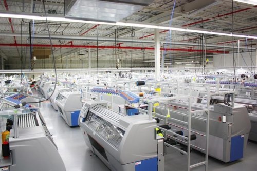 Myant currently manufacturers garments for Skiin using state of the art 3D robotic knitting machines, shown in a handout photo, in its nearly 7,500-square-metre facility in Etobicoke, Ont., and plans to open new production facilities as demand scales. THE CANADIAN PRESS/HO-Myant Inc. MANDATORY CREDIT