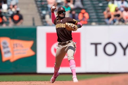 San Diego Padres shortstop Fernando Tatis Jr. throws out San Francisco Giants' Austin Slater at first base during the fifth inning of a baseball game in San Francisco, Sunday, May 9, 2021. (AP Photo/Jeff Chiu)